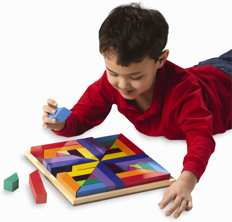 A child playing with tangrams.