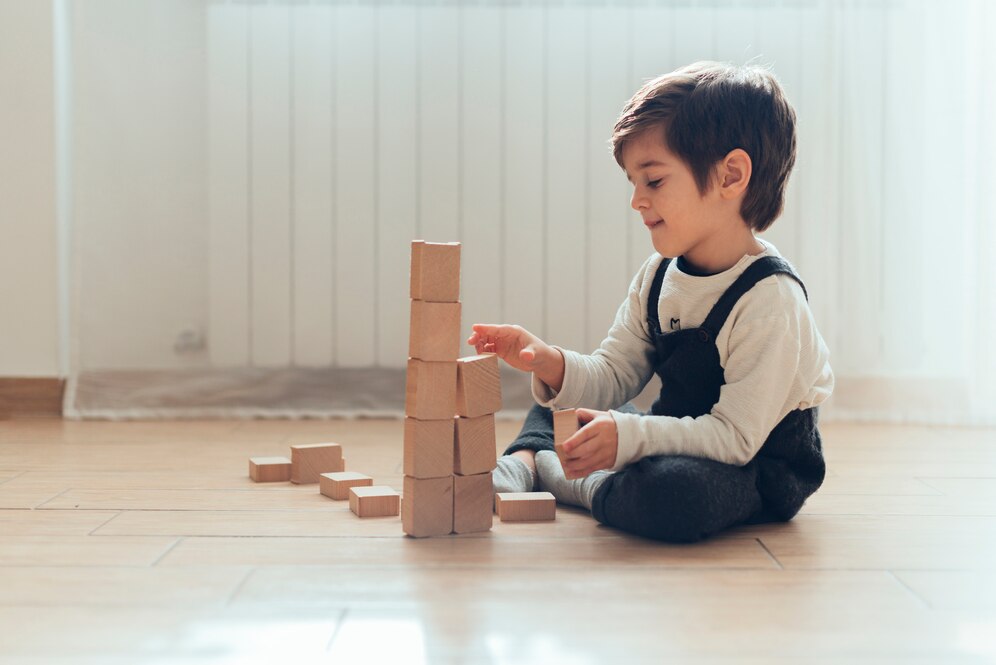 child playing with shapes