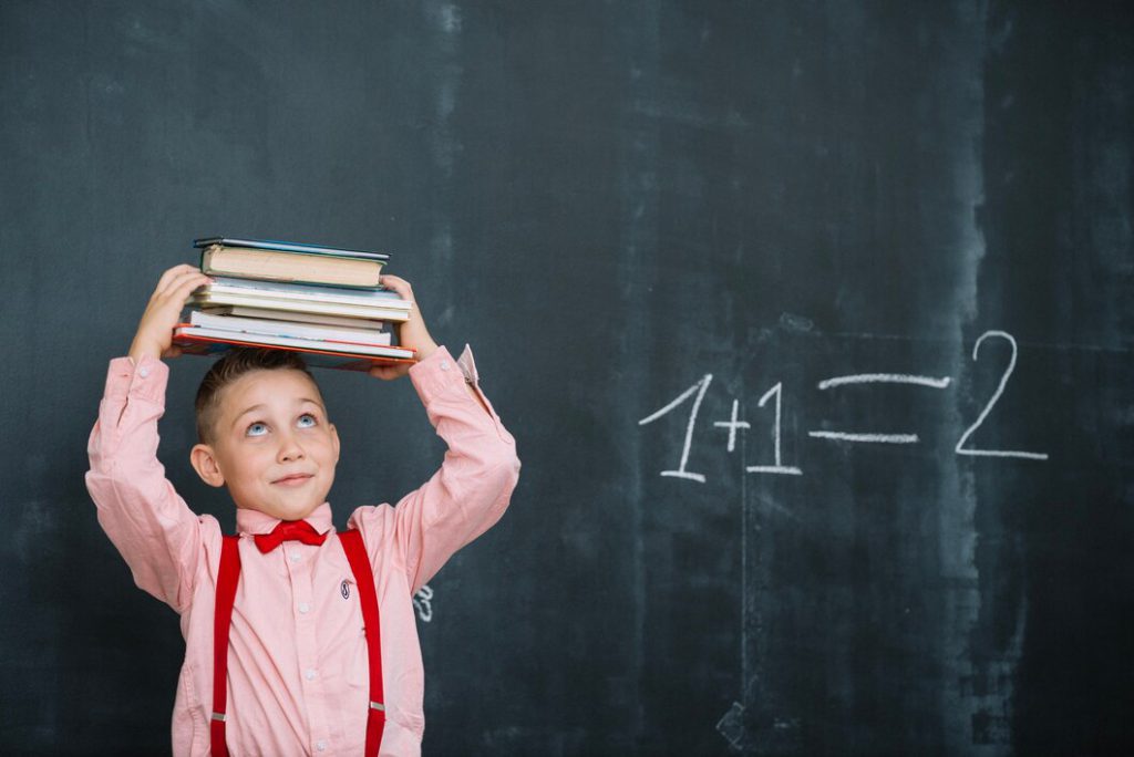 boy with books math class 23 2147663336